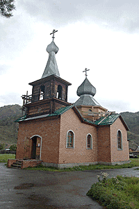 Церковью 